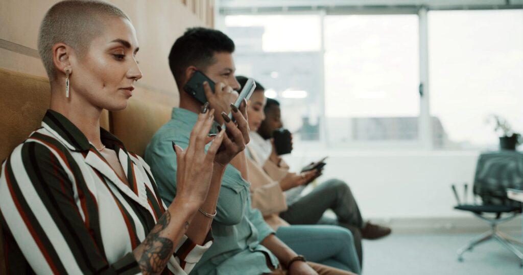Group of applicants waiting for interview – illustrates the hiring process of an onlyfans chatter job application